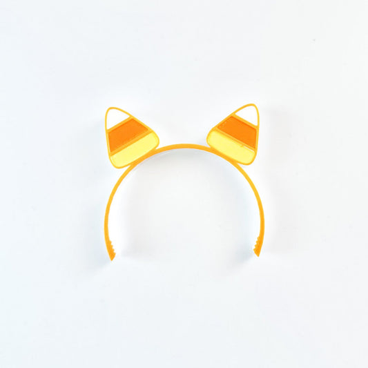 Yellow cat ear headband on a white background