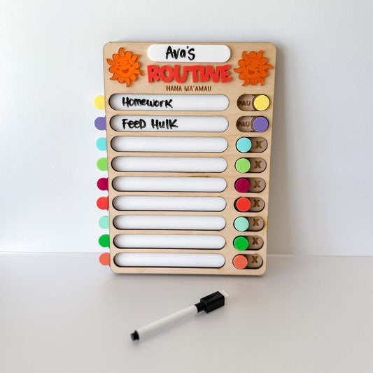 Wooden routine board with colorful labels and a marker on a white background
