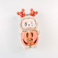 Halloween-themed plush toy with pumpkin face and leaf hat on a white background